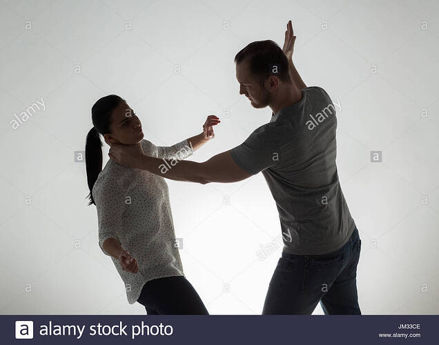 couple-having-fight-and-man-choking-woman-JM33CE